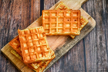  Fish and chips .Close up of   crispy breaded  deep fried fish fingers with breadcrumbs served with remoulade sauce and  lemon