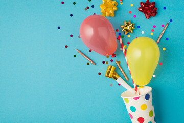Top view photo of birthday composition blast from paper dotted cup of tinsel sparkles red yellow...