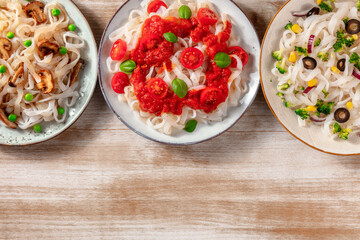 Konjac pasta with various toppings, overhead flat lay shot