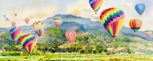  Watercolor landscape painting colorful of hot air balloon on village © Painterstock