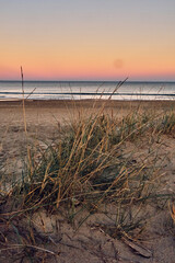 sunset on the sea dunes