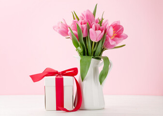 Pink tulip flowers bouquet and gift