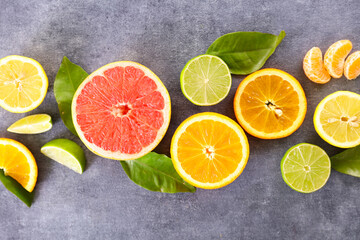 Fototapeta na wymiar citrus fruit and leaf- top view