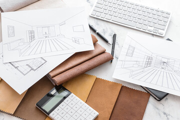 House plans, calculator and fabric samples on light background