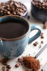 Cup of tasty hot coffee, closeup