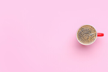Cup of tasty hot coffee on color background