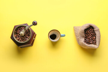 Composition with cup of hot coffee on color background