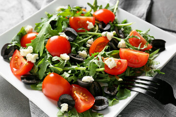 Plate of arugula salad, closeup