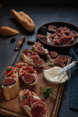 Tapas with ham and cream cheese.