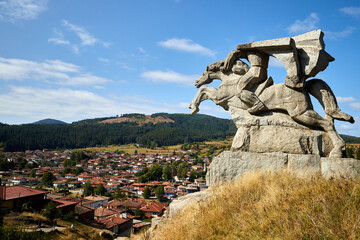 View of the historic village of Koprivshtitsa and the monument of the freedom fighter Benkovski,...