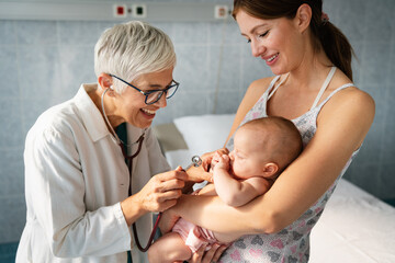 Pediatric doctor exams little baby. Health care, medical examination, people concept
