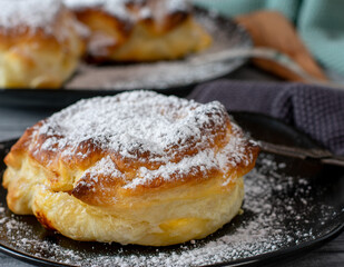 Puff pastry pieces with sour cream filling