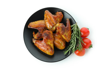 Baked chicken wings, tomatoes and rosemary isolated on white background