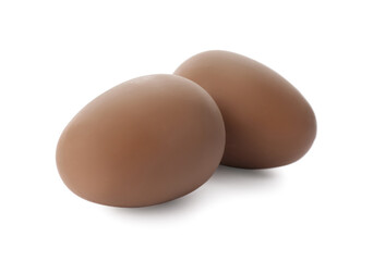 Two sweet chocolate eggs on white background