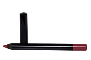 Cosmetic tools. Macro photograph of a professional red lip liner pencil isolated on a white...
