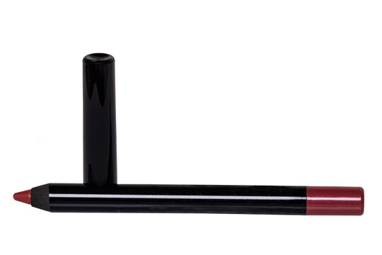 Cosmetic tools. Macro photograph of a professional red lip liner pencil isolated on a white background. Beauty concept.