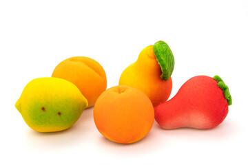 Fototapeta na wymiar Set of fruit marzipan candy isolated on white