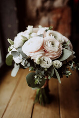 delicate wedding bouquet of white roses and ranculus stands on the background rbhgbxyjq cntys djpkt jryf