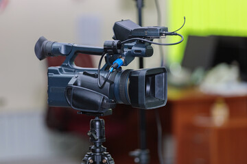 Video production covering event on stage by professional video camera
