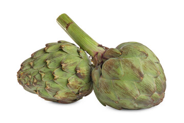 Whole fresh raw artichokes on white background