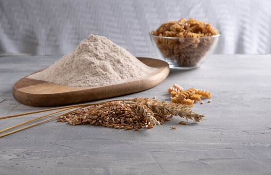 Spelt Flour with seeds and uncooked spelt pasta.