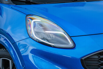 Obraz na płótnie Canvas car headlight detail
