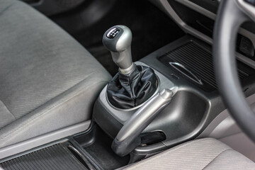 automatic transmission shift selector in the car interior. Closeup a manual shift of modern car gear shifter.