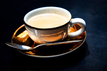 Fototapeta premium Wonderful cup of hot coffee on table