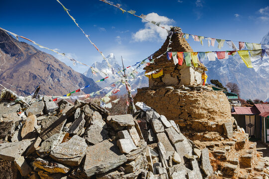 Buddhist stupa and prayer flags in the Himalaya mountains, Everest region, Nepal