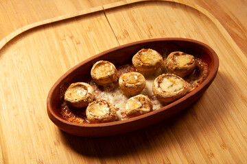 Baked white mushrooms in butter