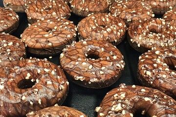 a foreground with glazed donuts