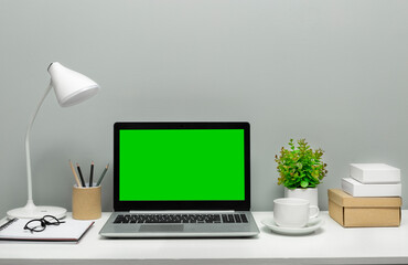 Mockup design laptop monitor screen with green screen. Desktop. Copy space. Blank.