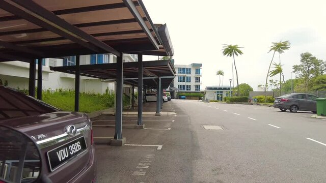 Motorcycle ride pov through the parking lot in Putra1 Apartment, Bandar Seri Putra. Photo may contain noise due to low light.