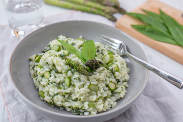 Spring food; Delicious risotto with asparagus and wild garlic
