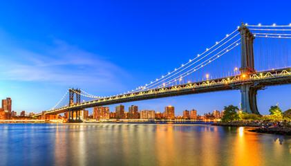 Fototapeta na wymiar Manhattan Bridge in New York City. is a suspension bridge that crosses the East River in New York City, connecting Lower Manhattan with Downtown Brooklyn.