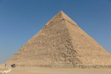 Fototapeta na wymiar Horse riding along the Great Pyramid of Giza.