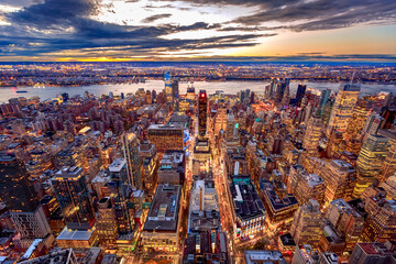 New York City Manhattan sunset skyline aerial view with office building skyscrapers and Hudson...