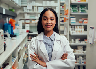 Portrait of happy professional female pharmacist in chemist - obrazy, fototapety, plakaty