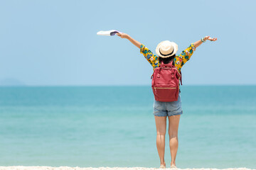 Happy traveler and tourism women travel summer on the beach.  Asia people holding map and raise...