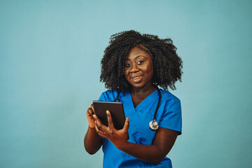 Nurse practitioner doctor with tablet and stethoscope