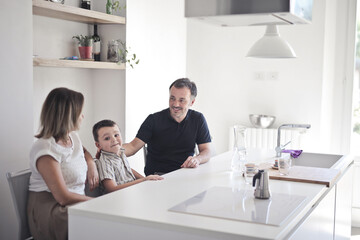 family in a modern kitchen