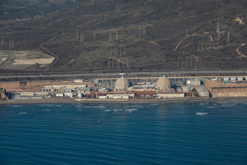 Aerial view of a nuclear power plant along the Californian Coast.