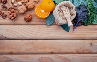 Ingredients for the healthy foods selection. The concept of healthy food set up on shabby wooden background.