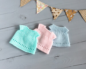 Small knitted dresses.