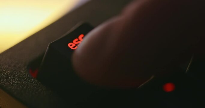 Hitting glowing Escape key on mechanical keyboard