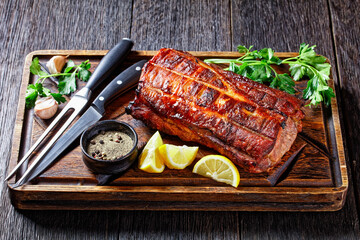 Barbecued Pork Loin Roast on a wooden board