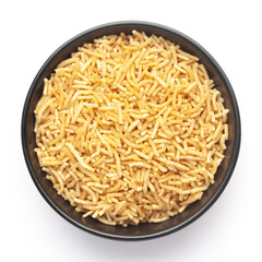 Close-Up of Salty plane Bhujia in a black ceramic bowl, made with Chickpeas or gram flour (Besan).  Indian salty snacks (Namkeen), Top View