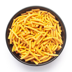 Close up of Marwadi Bhujiya Indian namkeen (snacks) on a ceramic black bowl. Top view