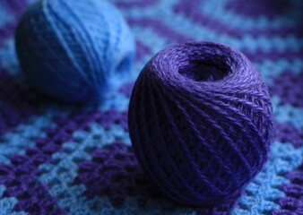 Plaid crocheted from blue and lilac threads
