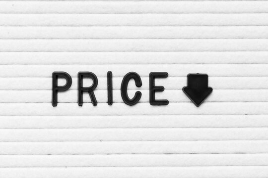 Black color letter in word price with down arrow on white felt board background